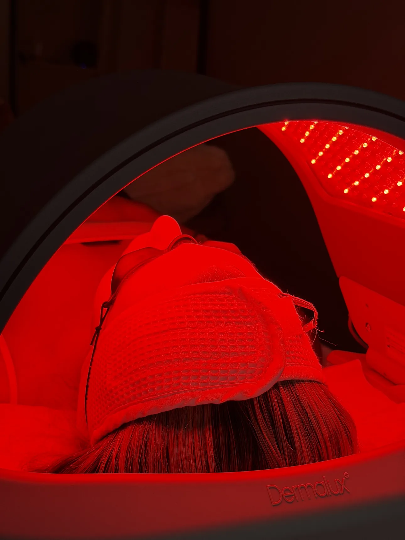 Medical-grade Dermalux LED Light Therapy Treatment Hood at SKIN CARD Clinic